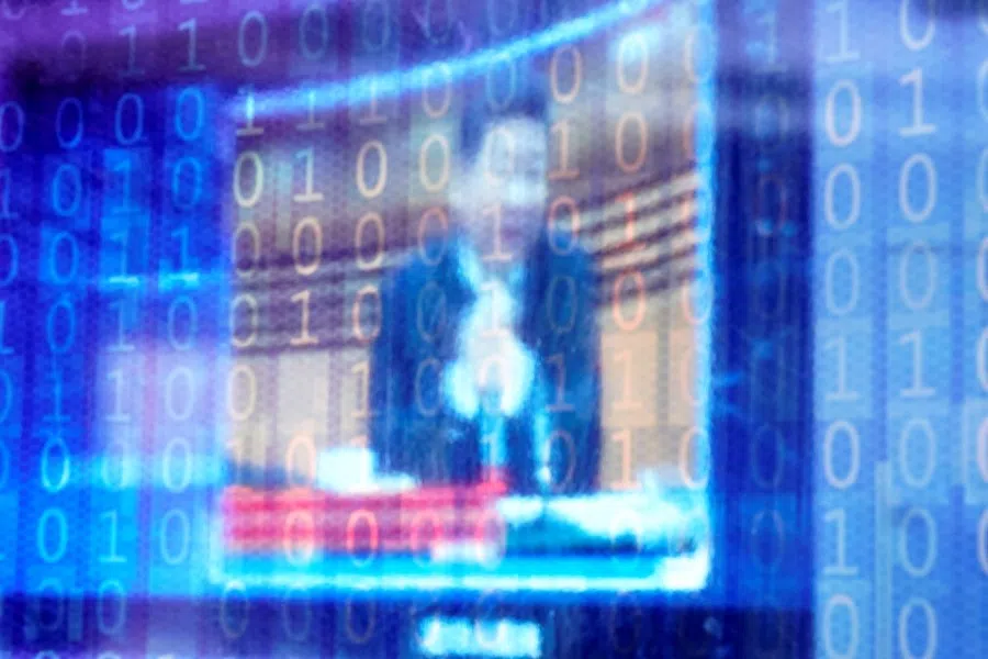 China's President Xi Jinping is shown on a screen through digitally decorated glass during the World Internet Conference (WIC) in Wuzhen, Zhejiang province, China, 23 November 2020. (Aly Song/REUTERS)