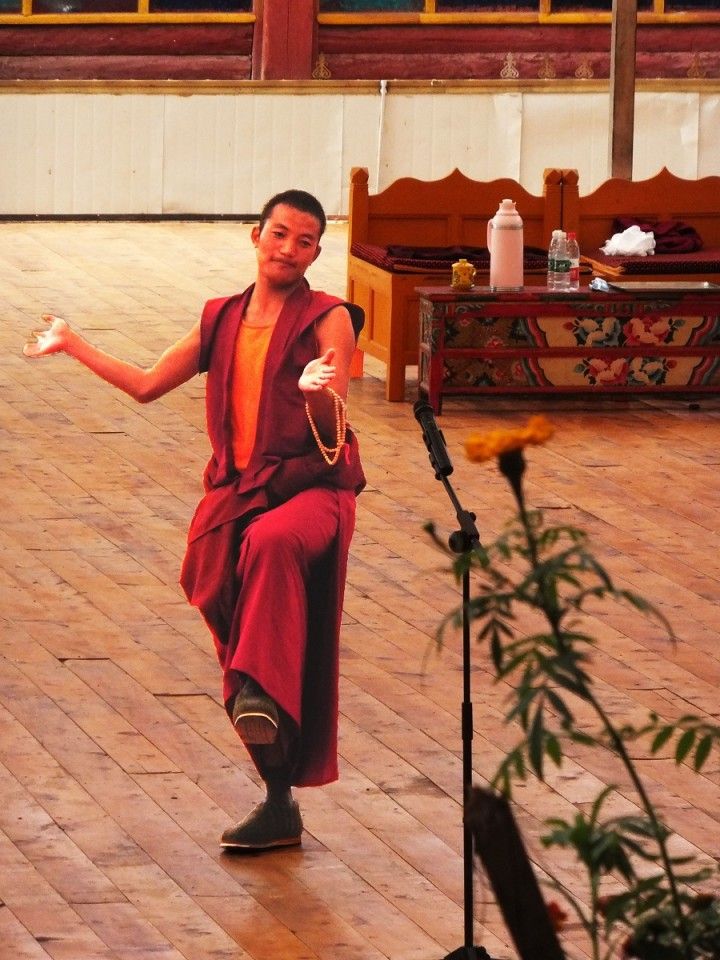 A monk debating in Litang monastery.