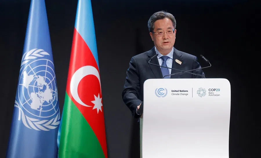 China’s First Vice-Premier Xuexiang Ding delivers a statement during the United Nations climate change conference (COP29), in Baku, Azerbaijan, on 12 November 2024. (Maxim Shemetov/Reuters)
