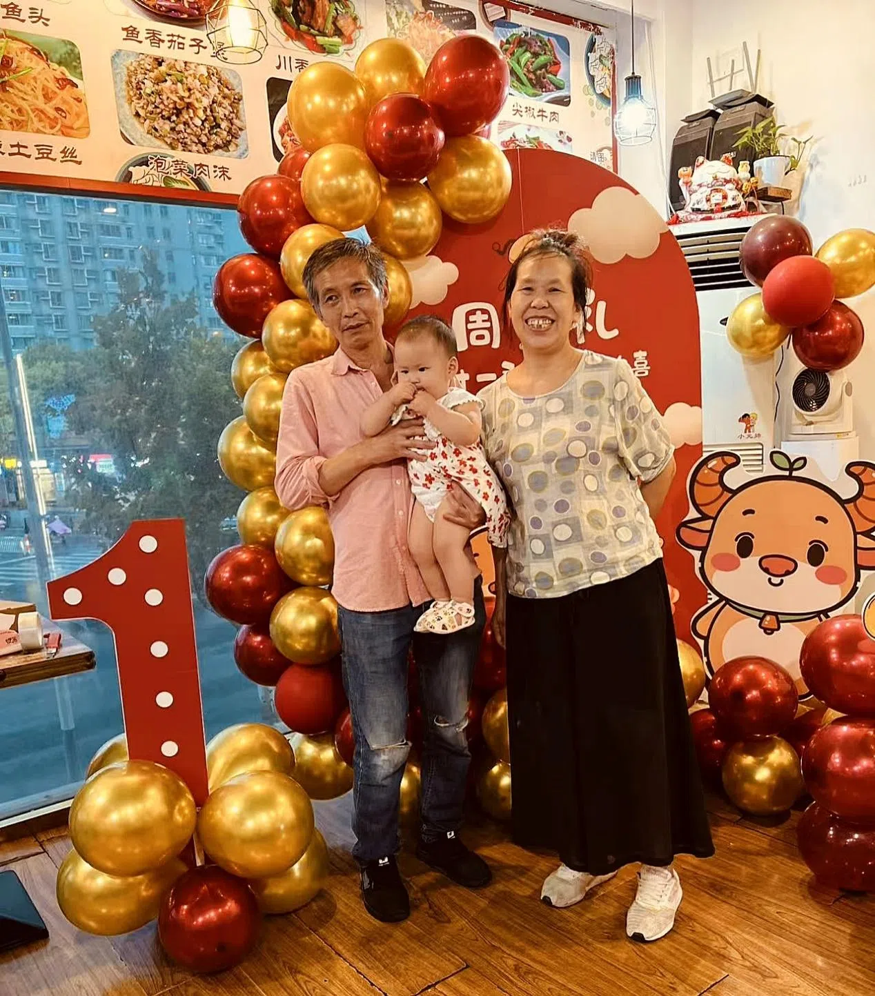 Above, Badi’s mother and father celebrate the birthday of their grandson in the restaurant. For them, this place really is a part of the family. (Courtesy of Eight Sisters Private Kitchen)