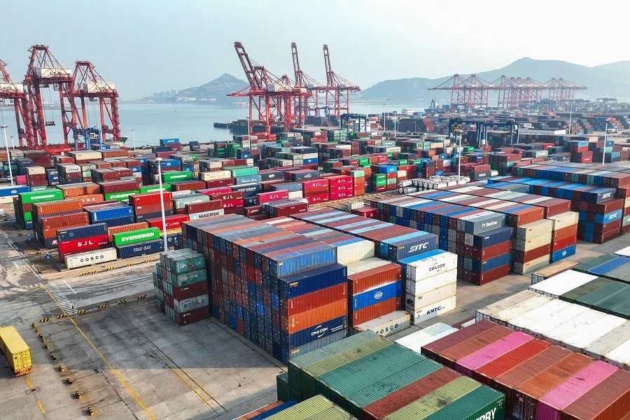 This aerial photo taken on 7 November 2022 shows containers stacked at a port in Lianyungang, Jiangsu province, China. (AFP)