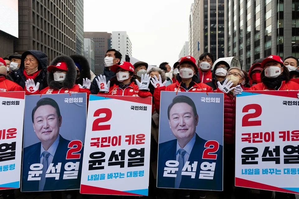 Supporters of Yoon Seok-youl, presidential candidate from the main opposition People Power Party, attend a campaign rally in Seoul, South Korea, on 15 February 2022. (SeongJoon Cho/Bloomberg)