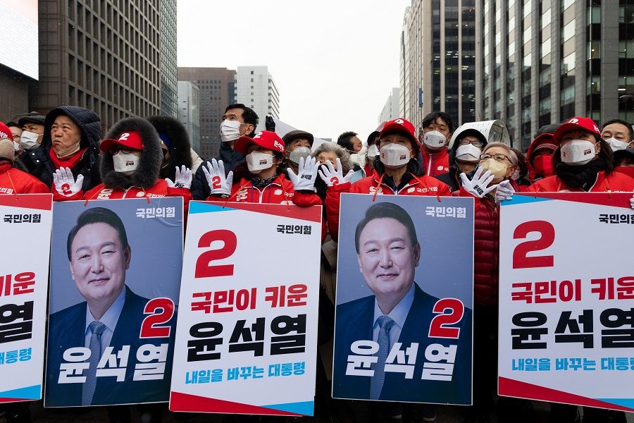 Supporters of Yoon Seok-youl, presidential candidate from the main opposition People Power Party, attend a campaign rally in Seoul, South Korea, on 15 February 2022. (SeongJoon Cho/Bloomberg)