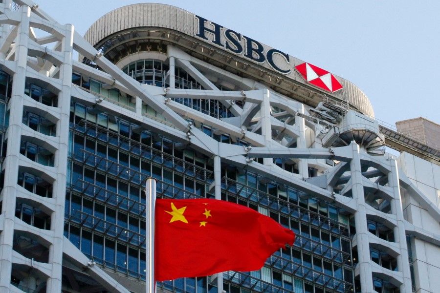 A Chinese national flag flies in front of HSBC headquarters in Hong Kong, China, 28 July 2020. (Tyrone Siu/Reuters)