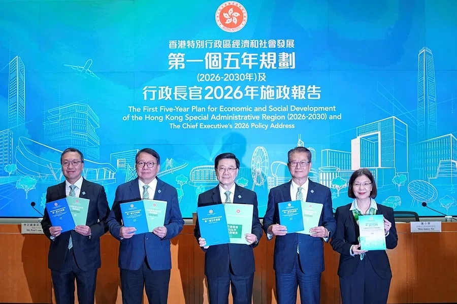 Hong Kong Chief Executive John Lee holds the booklets of his annual policy address and the first five-year plan at a press conference in Hong Kong, China, on 16 September 2026.