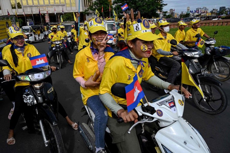 Supporters of the Royalist party FUNCINPEC take part in a campaign rally ahead of the upcoming election in Phnom Penh on 2 July 2023. Cambodians go to the polls on 23 July 2023. (Tang Chhin Sothy/AFP)