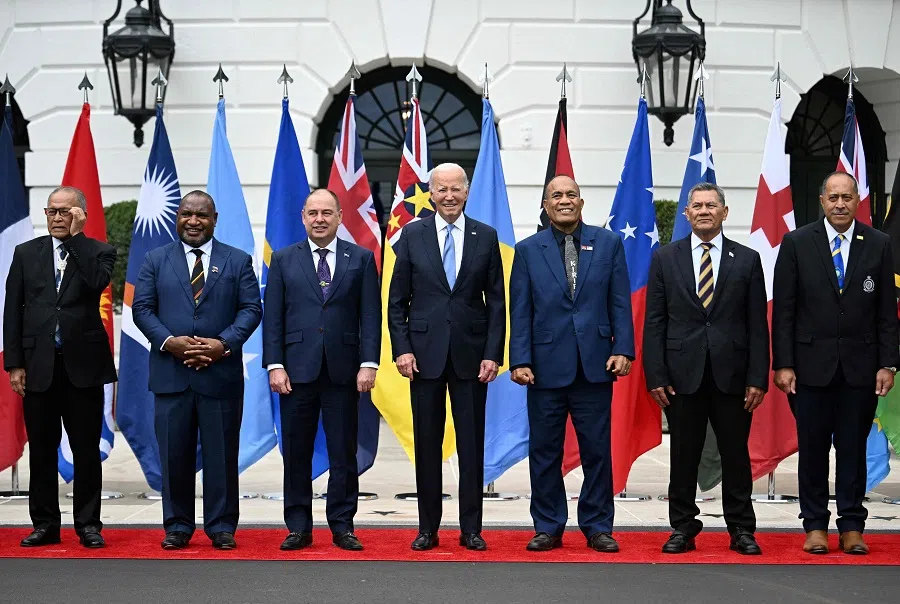 From left to right, President of the Marshall Islands David Kabua, Papua New Guinean Prime Minister James Marape, Cook Islands Prime Minister Mark Brown, US President Joe Biden, Kiribati President Taneti Maamau, Tuvaluan Prime Minister Kausea Natano, and Premier of Niue Dalton Tagelagi stand for a group photo following the Pacific Islands Forum (PIF) summit, at the South Portico of the White House in Washington, DC, on 25 September 2023. (Jim Watson/AFP)