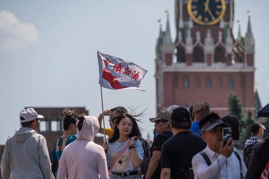 A group of tourists from Shanghai on Red Square in central Moscow on 3 July 2024. (Andrey Borodulin/AFP)