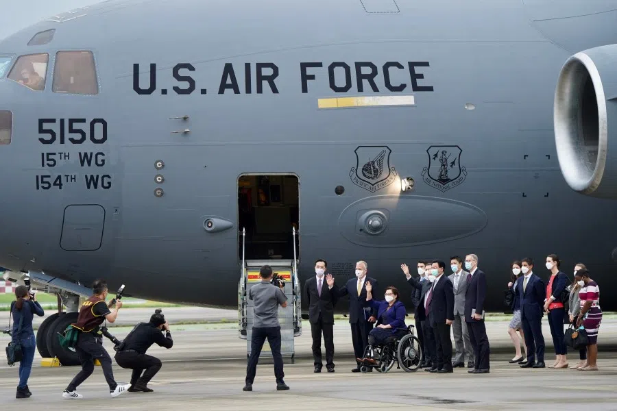 A delegation comprised of senators Tammy Duckworth, Christopher Coons and Dan Sullivan poses for photographs with Taiwan’s Foreign Minister Joseph Wu and American Institute in Taiwan (AIT) Director Brent Christensen and other officials following their arrival at the Songshan Airport in Taipei on 6 June 2021. (Aden Hsu/AFP)