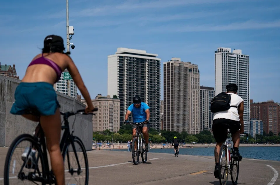 Cyclists on Lakefront Trail along Lake Michigan in Chicago, Illinois, US, 14 August 2024. (Al Drago/Bloomberg)