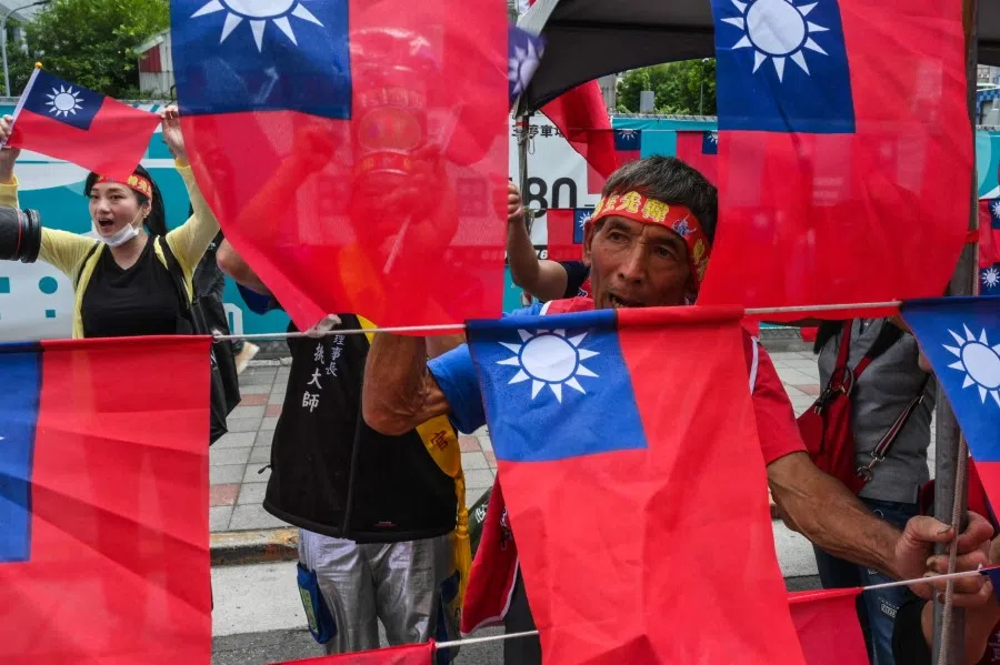 Supporters of the Kuomintang (KMT) rally outside the KMT headquarters in Taipei on 17 May 2023. (Sam Yeh/AFP)