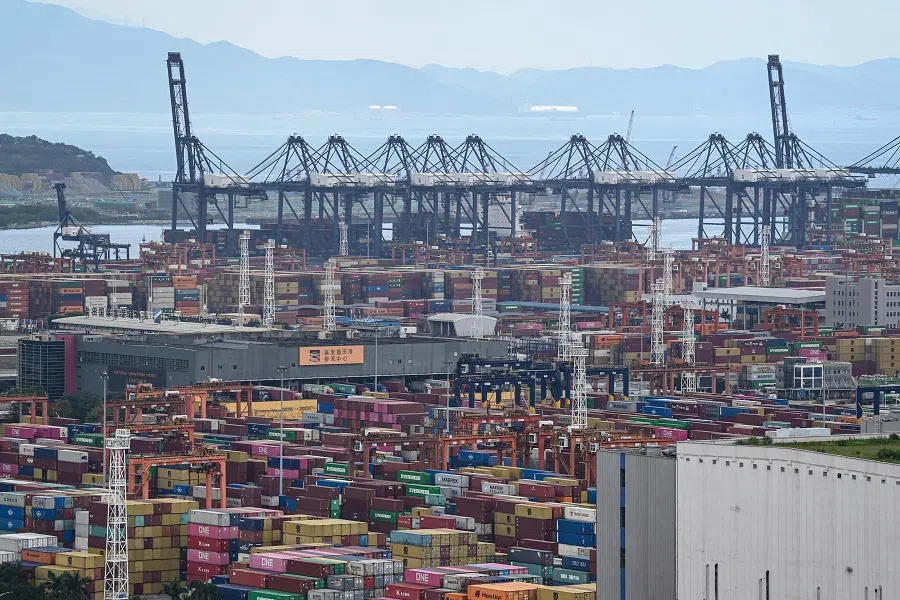 Shipping containers and gantry cranes are seen at Yantian port in Shenzhen, Guangdong province, China, on 12 June 2024. (Jade Gao/AFP)