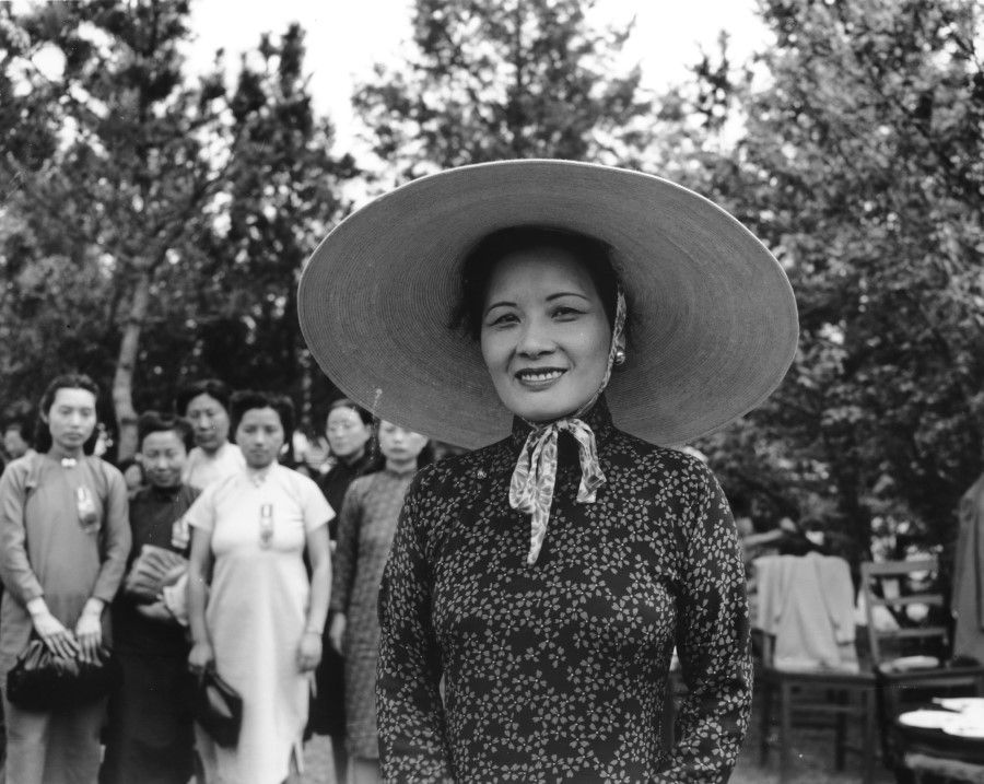 Soong Mei-ling in a wide-brimmed straw hat at a reception for the female delegates of the National Assembly, 1948.