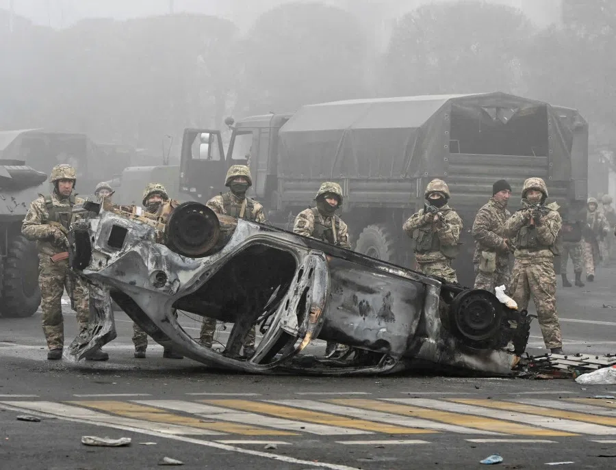 Troops are seen at the main square where hundreds of people were protesting against the government, after authorities' decision to lift price caps on liquefied petroleum gas, in Almaty, Kazakhstan, 6 January 2022. (Mariya Gordeyeva/Reuters)