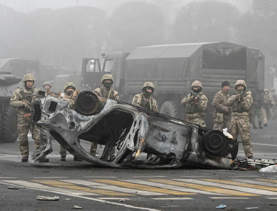 Troops are seen at the main square where hundreds of people were protesting against the government, after authorities' decision to lift price caps on liquefied petroleum gas, in Almaty, Kazakhstan, 6 January 2022. (Mariya Gordeyeva/Reuters)