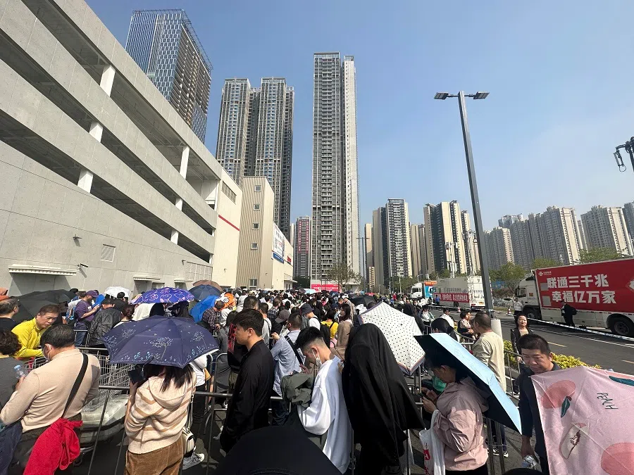 People queueing outside Costco on its opening day on 12 January 2024 in Shenzhen's Longhua district, China.