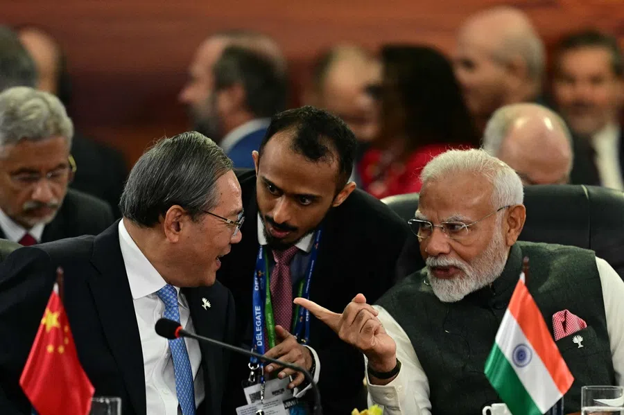China’s Premier Li Qiang (left) talks with India’s Prime Minister Narendra Modi (right) during a plenary session of the BRICS summit in Rio de Janeiro, Brazil, on 7 July 2025. (Pablo Porciuncula/AFP)