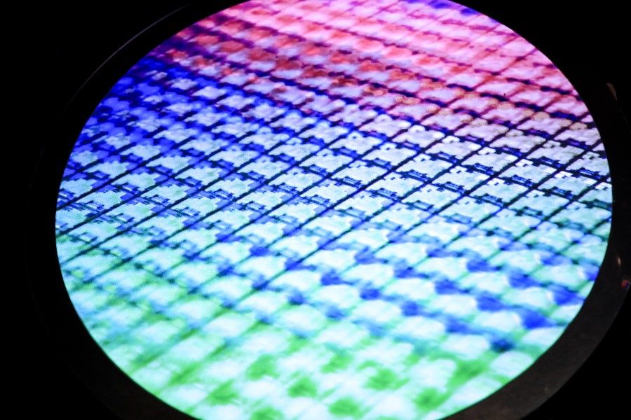 An image of a semiconductor wafer at the Taiwan Semiconductor Manufacturing Co. (TSMC) Museum of Innovation in Hsinchu, on 11 January 2022. (I-Hwa Cheng/Bloomberg)