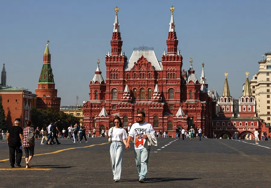 People walk in Red Square in central Moscow, Russia, on 10 September 2024. (Evgenia Novozhenina/Reuters)