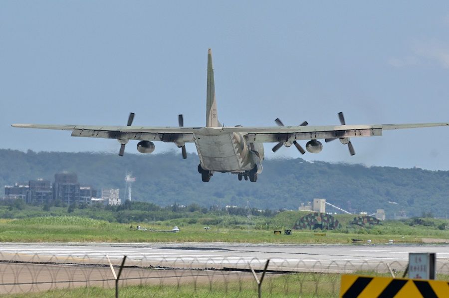 A US-made C-130 aircraft prepares to land on a runway at the Hsinchu Air Base in Hsinchu, Taiwan, on 5 August 2022. (Sam Yeh/AFP)