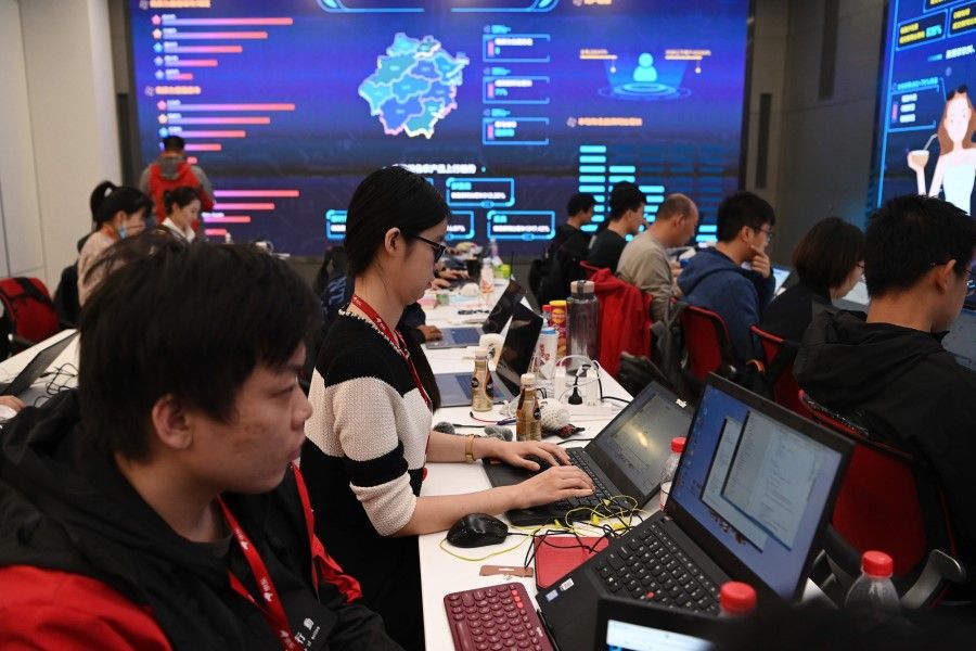 Data room operators work at the headquarters of online shopping platform JD.com during the Singles' Day shopping festival in Beijing on 11 November 2020. (Greg Baker/AFP)