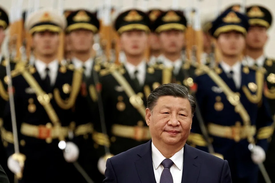 Chinese President Xi Jinping pictured standing in front of the honour guard at the Great Hall of the People in Beijing, China, on 22 November 2023. (Florence Lo/Reuters)