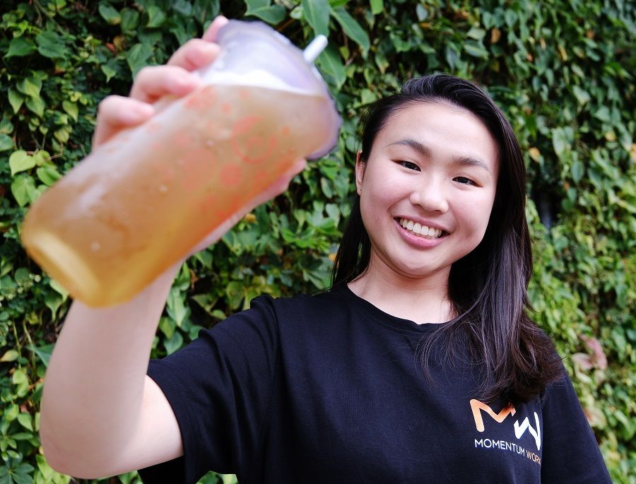 Vion Yau, head of insights at Momentum Works, studies the local bubble tea market and trends. (SPH Media)
