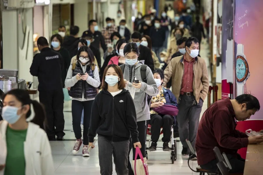 Commuters at a subway station in Shanghai, China, on 10 October 2022. (Qilai Shen/Bloomberg)