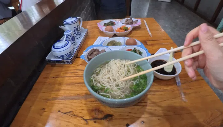 A freshly prepared bowl of noodles at the Gansu Xinglong Lanzhou Beef Noodle Vocational Training School.