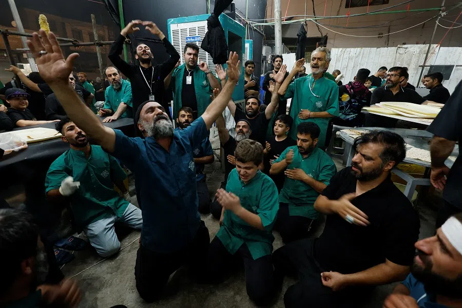 Iranian Shi’ite Muslim pilgrims gather near Imam Ali Shrine ahead of the Shi’ite ritual of Arbaeen, in Najaf, Iraq, on 13 August 2024. (Alaa al-Marjani/Reuters)