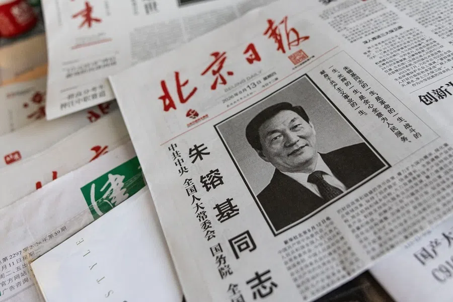 A newspaper with an obituary of late former Chinese Premier Zhu Rongji on the front, who passed away on 12 August 2026, is displayed at a news stand in Beijing, China, on 13 August 2026.