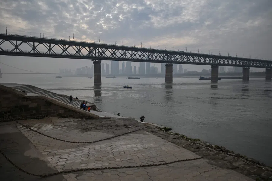 A general view of Wuhan Bridge over Yangtze River in Wuhan, China's central Hubei province is seen on 2 February 2021. (Hector Retamal/AFP)