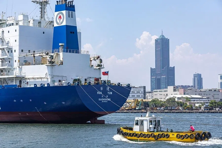 A small boat sails near the CPC Corporation oil tanker Hua Yun in the Port of Kaohsiung, with the 85 Sky Tower seen in the background, in Kaohsiung on 29 May 2026.