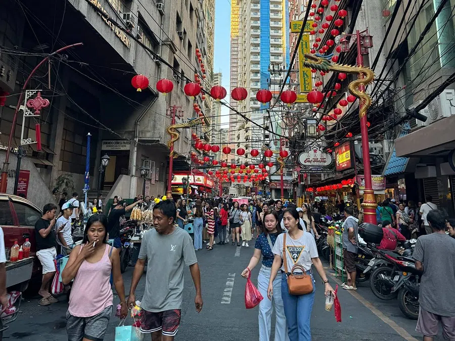 People in Chinatown in Manila on 12 August 2024.  (SPH Media)