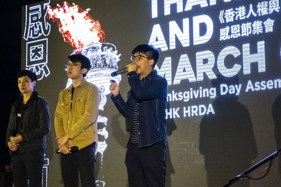 Joshua Wong, co-founder of the Demosisto political party, delivers a speech during the "Thanksgiving Day Assembly for Hong Kong Human Rights and Democracy Act" at Edinburgh Place in the Central district of Hong Kong, China, on Thursday, Nov. 28, 2019. (Chan Long Hei/Bloomberg)