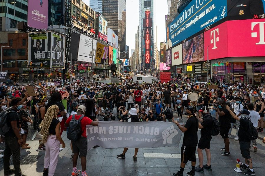 BLM protesters gather at Times Square to march uptown via the Henry Hudson Parkway on 9 August 2020 in New York City. (David Dee Delgado/Getty Images/AFP)