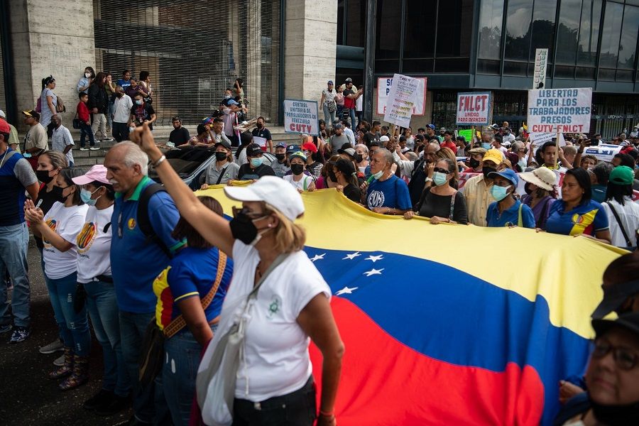 Demonstrators march during a workers' rights protest in Caracas, Venezuela, on 11 August 2022. (Carolina Cabral/Bloomberg)