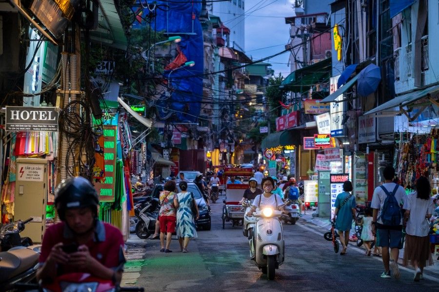 A motorcyclist travels along a road in Hanoi, Vietnam, on 18 September 2020. (Linh Pham/Bloomberg)