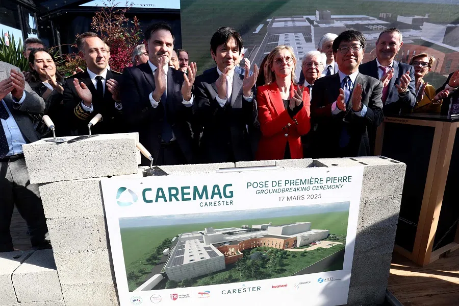 French Minister of Minister of Ecological Transition, Biodiversity, Forest, Sea and Fisheries Agnes Pannier-Runacher (second from right), Japanese ambassador to France Yoshio Ando (right), director of Japan’s Ministry of Economy, Trade and Industry, Hideyuki Hurata and French Delegate Minister for Foreign Trade and French Nationals Abroad Laurent Saint-Martin (second from left) applaud during the groundbreaking ceremony of the Caremag plant, a pioneer of the recycling of rare-earth permanent magnets, in Lacq, south-western France, on 17 March 2025. (Romain Perrocheau/AFP)