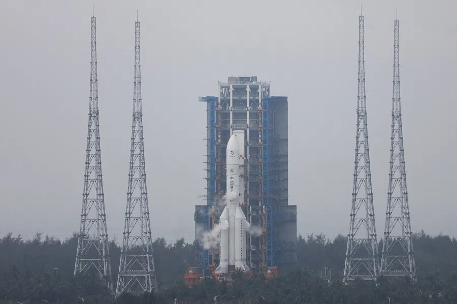 The Chang’e 6 lunar probe and the Long March-5 Y8 carrier rocket combination sit atop the launch pad at the Wenchang Space Launch Site in Hainan province, China, on 3 May 2024.  (Eduardo Baptista/Reuters)