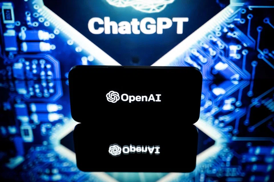 This file photo taken on 23 January 2023 in Toulouse, southwestern France, shows screens displaying the logos of OpenAI and ChatGPT. (Lionel Bonaventure/AFP)