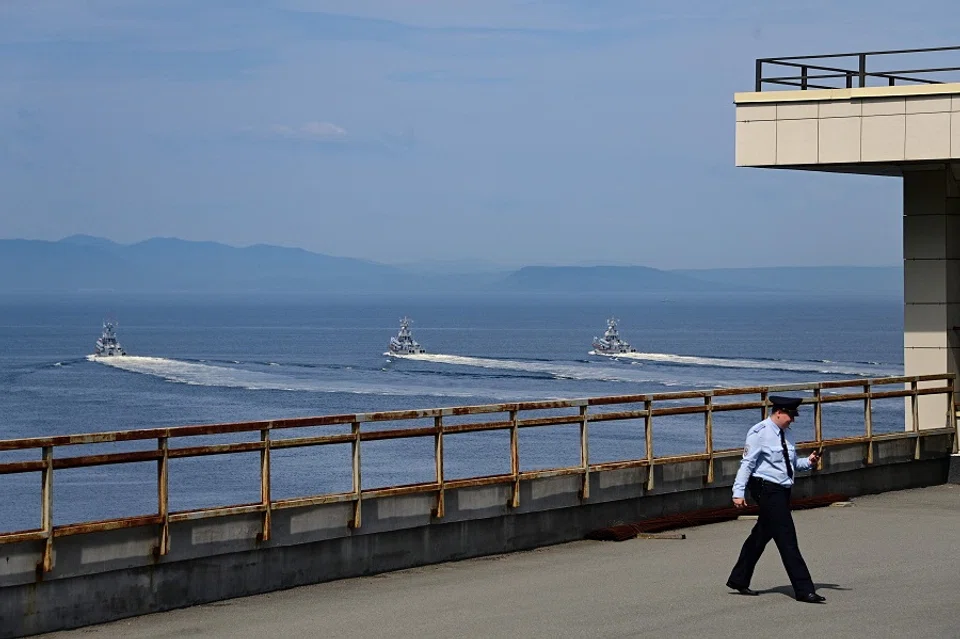 Russia's Pacific Fleet warships parade off the port city of Vladivostok during the Navy Day celebrations on 30 July 2023. (Pavel Korolyov/AFP)