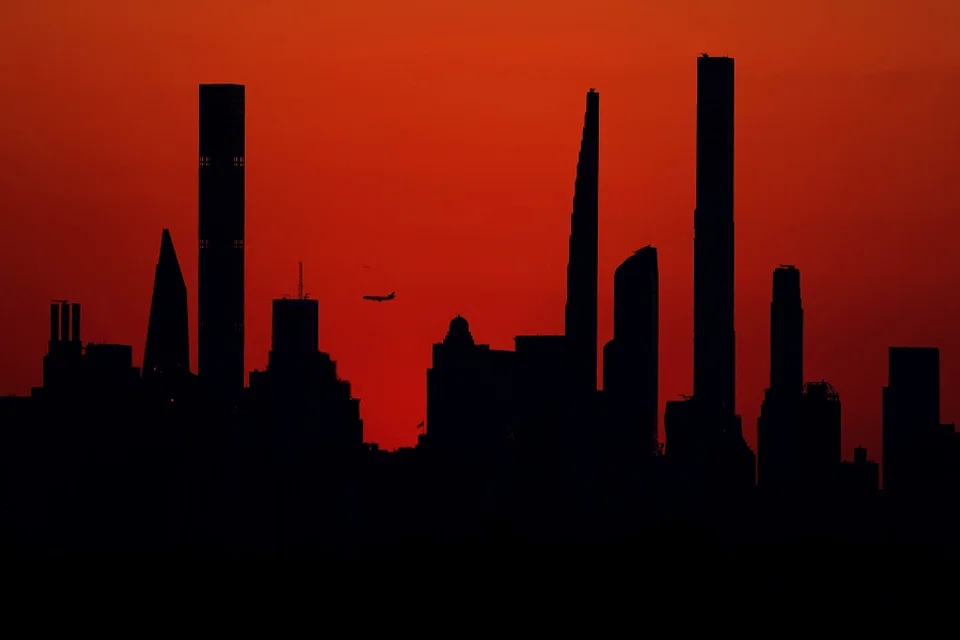 The New York City skyline is seen at sunset on 6 September 2023 in the Flushing neighborhood of the Queens borough of New York City. (Al Bello/AFP)