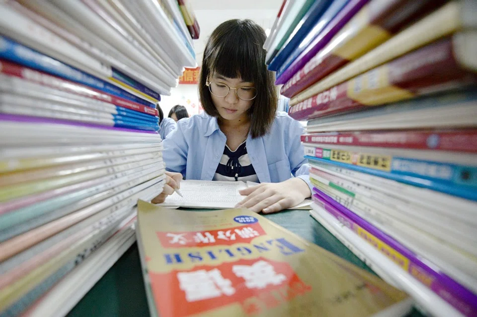 Mountain loads to cover before the gaokao. (STR/AFP)