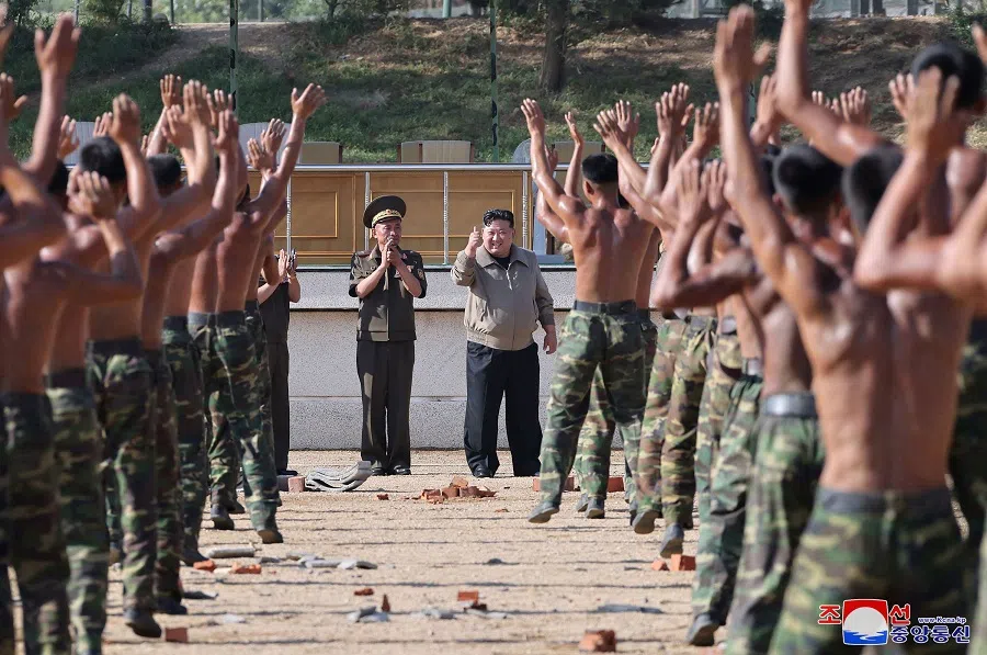 This photo taken on 11 September 2024 and released from North Korea’s official Korean Central News Agency (KCNA) via KNS on 13 September 2024 shows North Korean leader Kim Jong Un (centre) inspecting the training base of the special operation armed force of the Korean People’s Army (KPA) at an undisclosed location in North Korea.