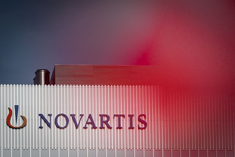 This photograph taken on 30 October 2022 shows the logo of the Swiss pharmaceutical and drugmaker Novartis on a building in Basel, Switzerland. (Gabriel Monnet/AFP)