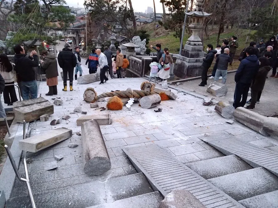 Collapsed torii gate caused by an earthquake is seen at Onohiyoshi Shrine in Kanazawa, Ishikawa prefecture, Japan, on 1 January 2024, in this photo released by Kyodo. (Kyodo via Reuters)