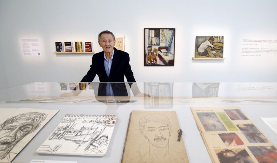 Ho Ho Ying and his works, during an exhibition at Esplanade Mall, 2021. (SPH Media)