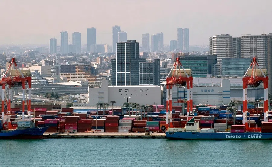 Containers are seen at the international cargo terminal at the port of Tokyo on 18 March 2020. (Kazuhiro Nogi/AFP)