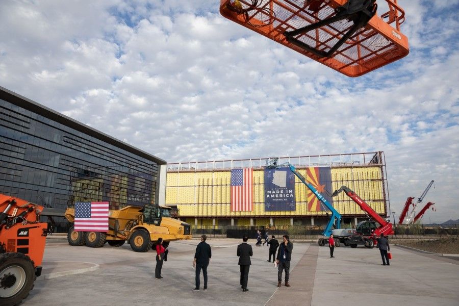 Attendees ahead of a "First Tool-In" ceremony at the Taiwan Semiconductor Manufacturing Co. facility under construction in Phoenix, Arizona, US, on 6 December 2022. (Caitlin O'Hara/Bloomberg)